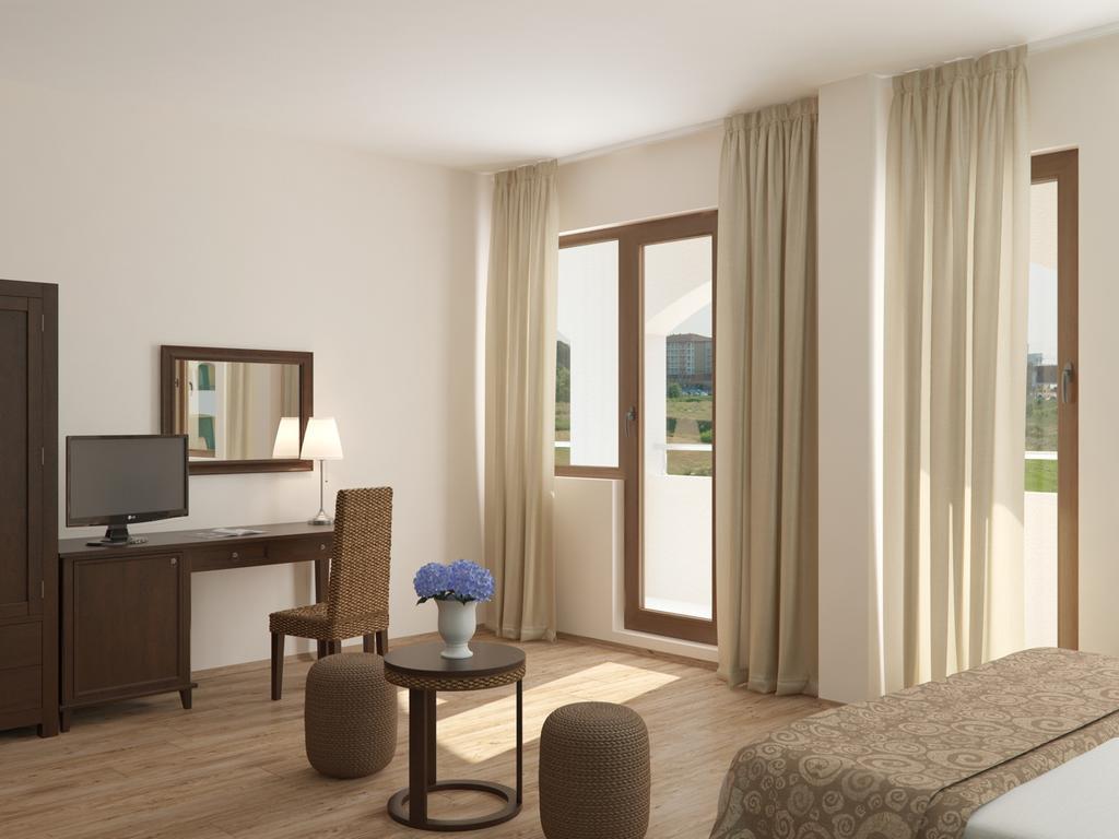 Double Room with Balcony and Partial Sea View (2 Adults + 1 Child)